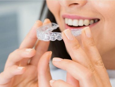 Smile Confidently: How Invisalign Transforms Lives