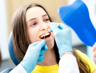 Shining Smiles & Healthy Teeth: The Importance of Professional Cleanings